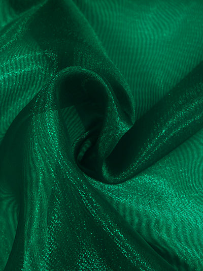 Close-up of vibrant green Organza - Lush Meadow - 150cm by Super Cheap Fabrics; lightweight and swirling with shiny, translucent elegance, soft folds, and highlights.