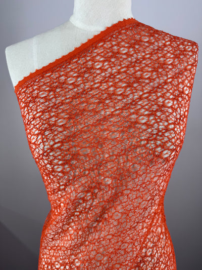 Orange cotton lace fabric