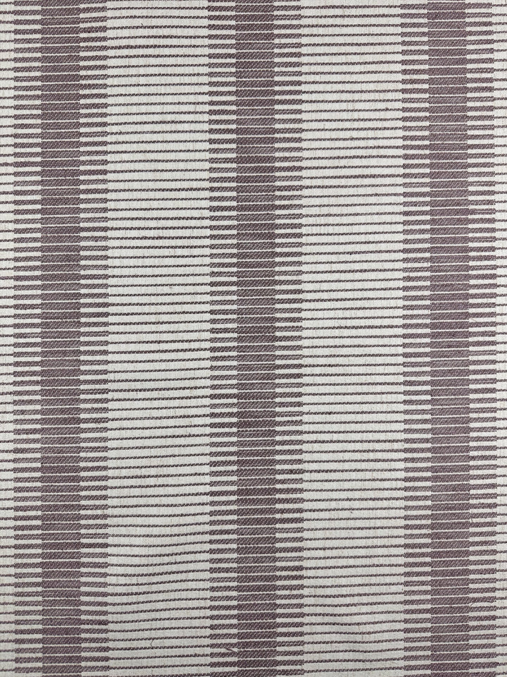 Super Cheap Fabrics’ Striped Woven Upholstery – Melmoth (142cm) features wide, dark gray vertical stripes and fine horizontal lines on white, creating a grid-like burlwood-inspired texture.