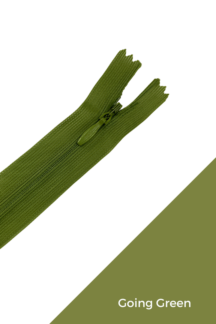 An Invisible Zip - 30cm in olive green polyester by Super Cheap Fabrics, partially unzipped on a white background with a diagonal green corner displaying "Going Green.