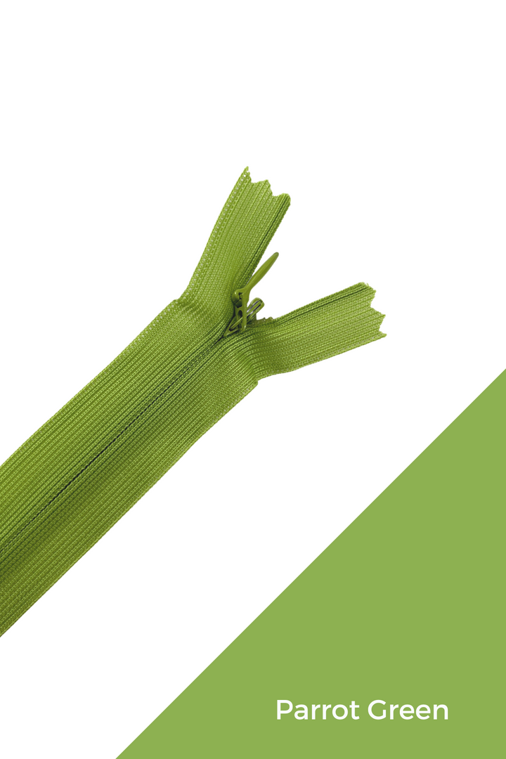 A 30cm parrot green Invisible Zip from Super Cheap Fabrics, partially unzipped and shown on a white and green diagonal background with "Parrot Green" text in the bottom right corner.